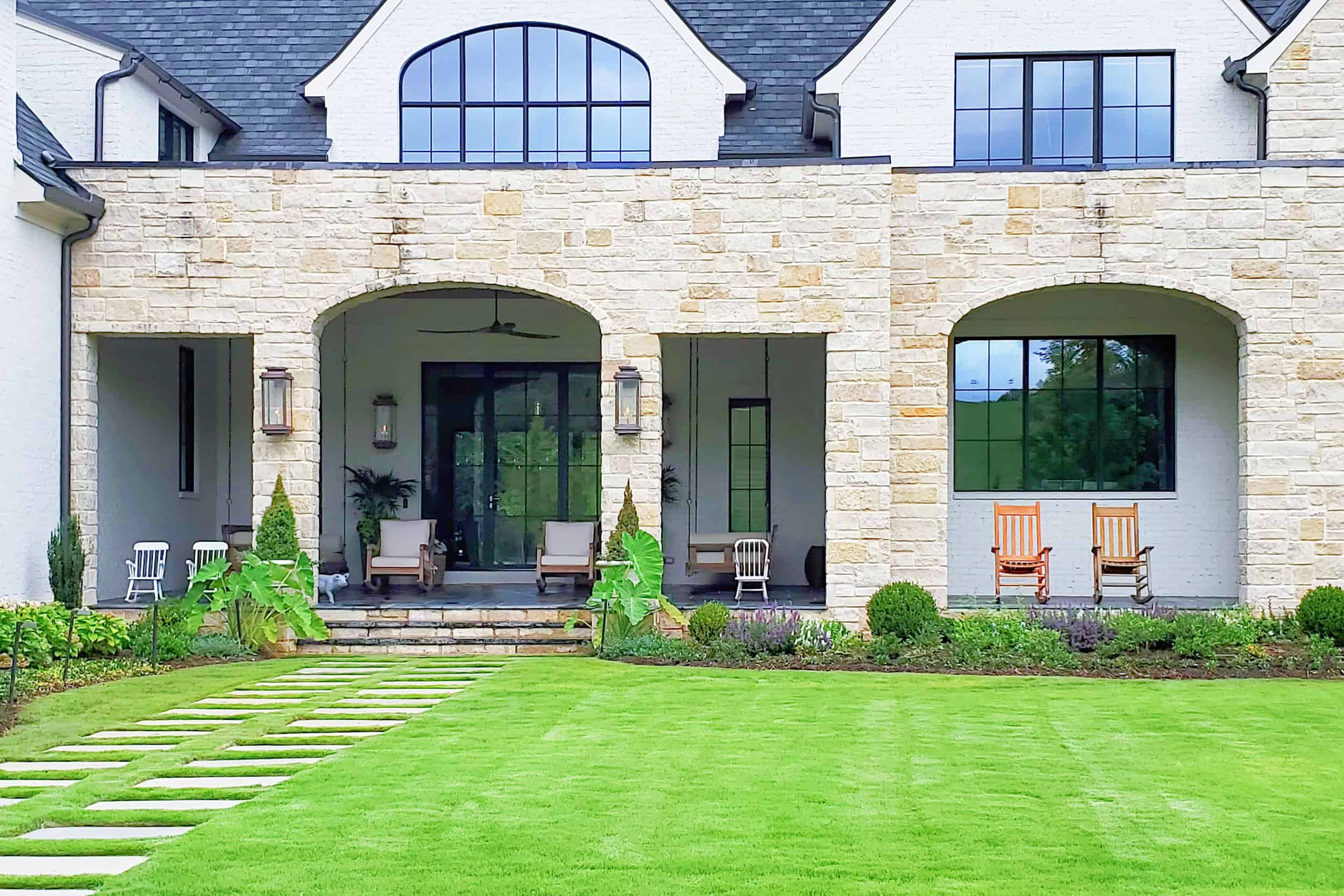 English style garden landscaping at front of house in Berkeley Lake