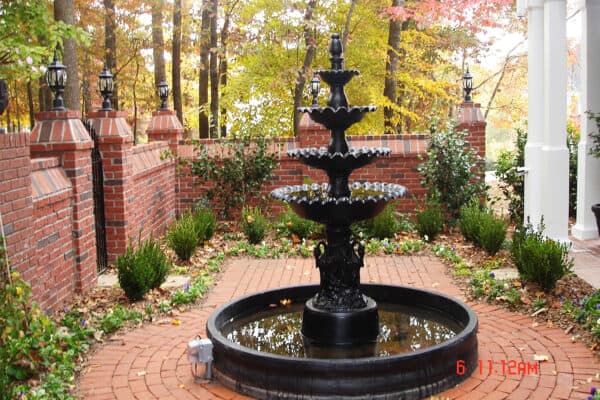 Braselton New Orleans Style Cast Iron Fountain in Brick Walled Courtyard Garden