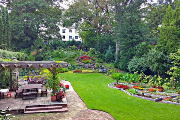 Oasis City Garden with patios food garden hillside planting in Atlanta